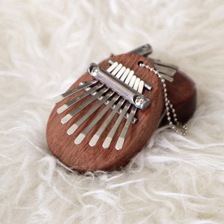 Enhance your Raya with our captivating thumb piano, also known as a kalimba.